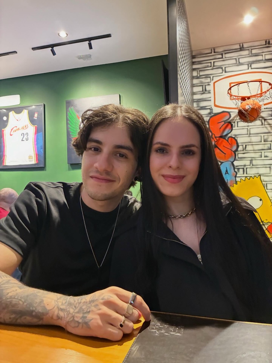 Gabriel and his partner at a restaurant